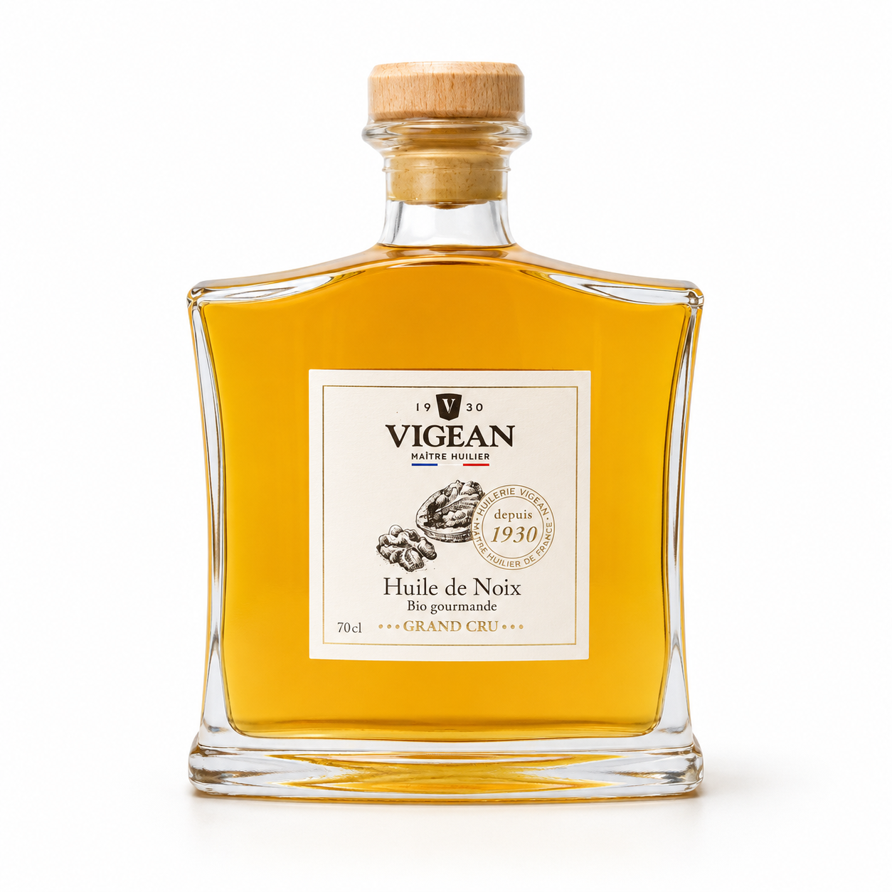Bottle of Vigean walnut oil with a cork lid on a white background