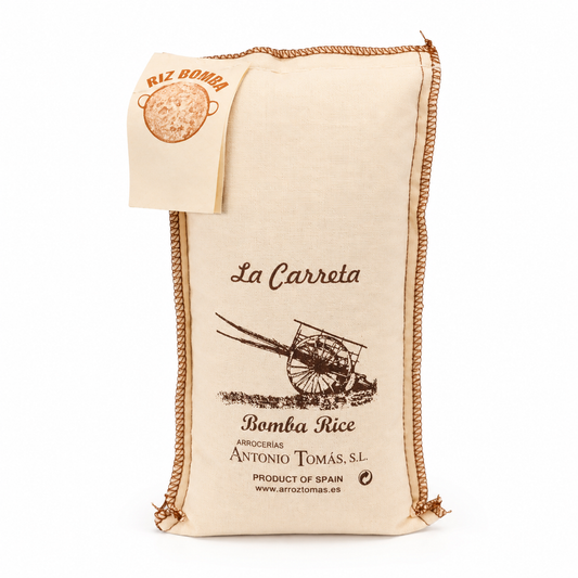 Beige rice bag with 'La Carreta' branding and rice logo on a white background