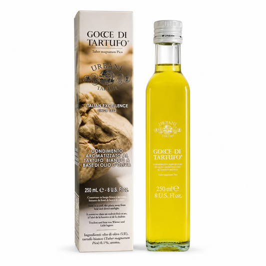 Bottle of Goce di Tartufo olive oil with packaging on a white background