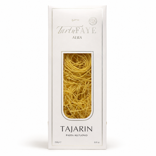 Box of Tarta Faye Alba Tajarin pasta on a white background