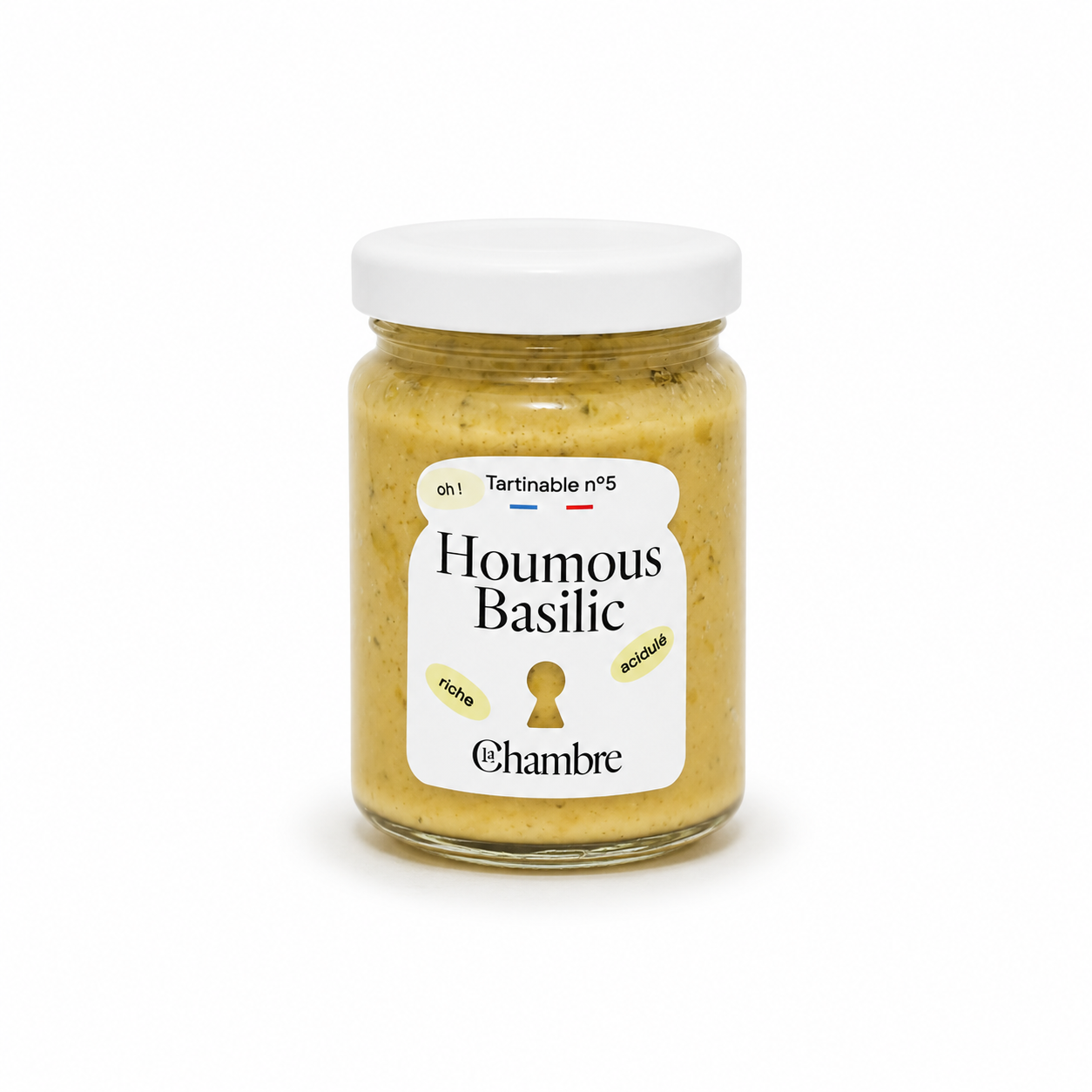 Jar of Houmous Basilic with a white label on a white background