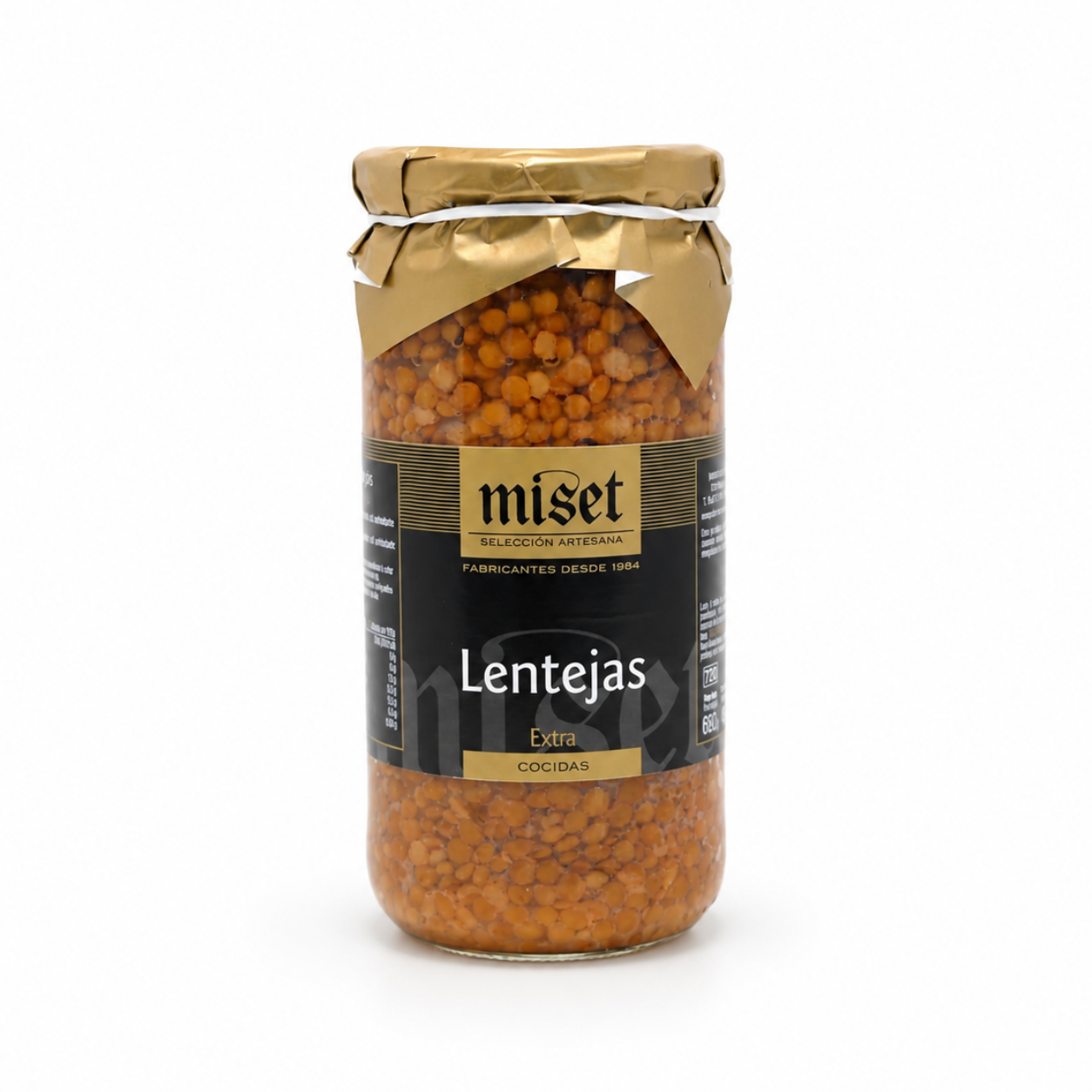 Jar of Miset lentils on a white background