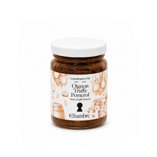Jar of Oignon Truffe Pomelos with a white label on a white background