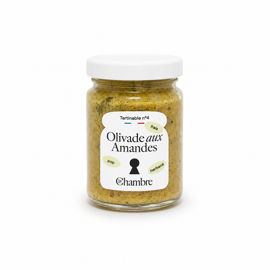 Jar of Olivade aux Amandes with a white label on a white background