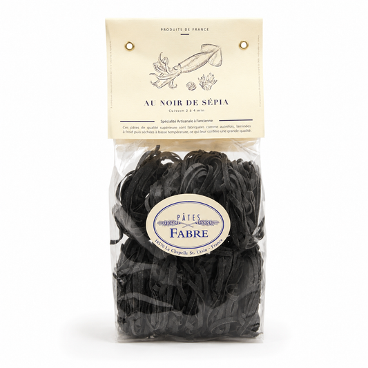 Packaged black pasta with Fabre label on a white background